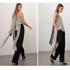 Obando
Sleeveless Wrap Neck Top